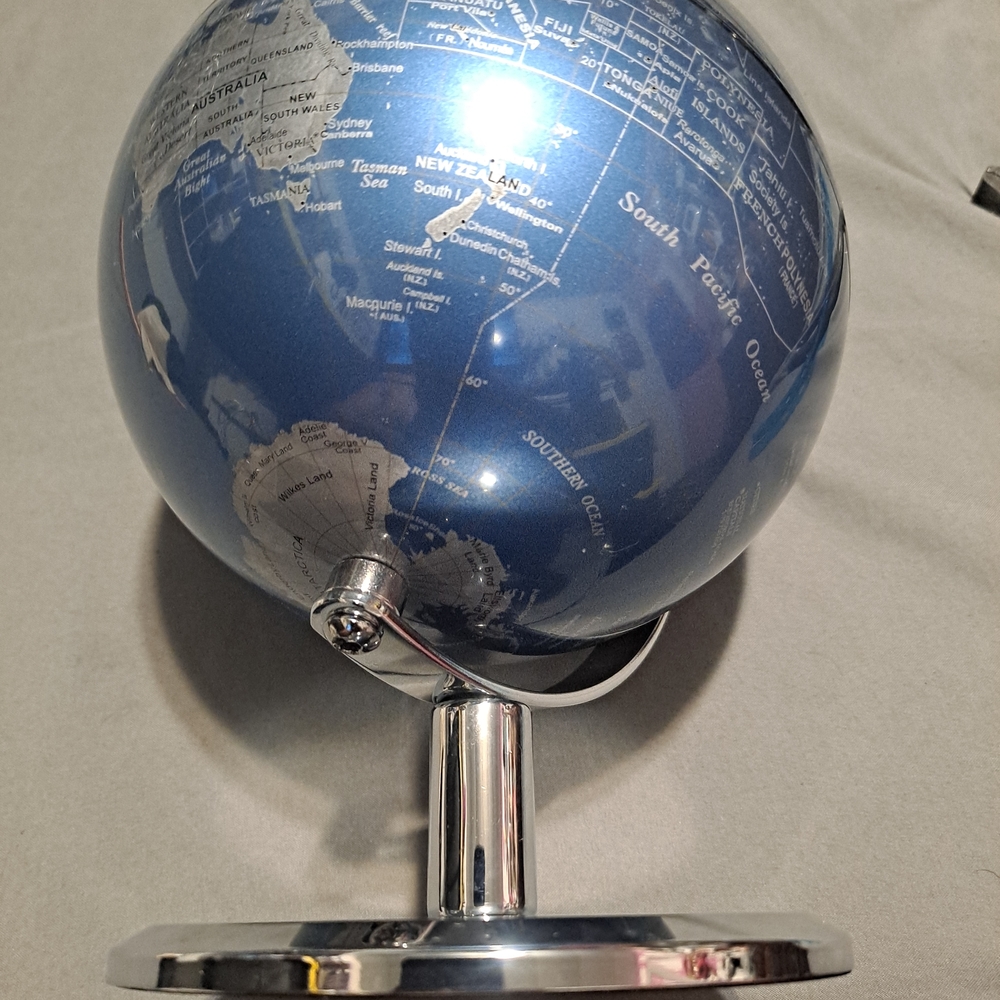 Blue and Silver World Globe. 6 Inches Diameter. Tall 9 Inches.